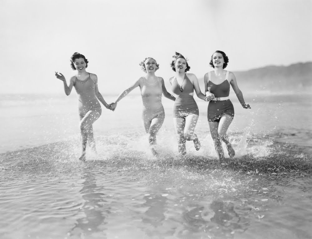 women running on beach