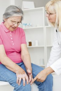Senior woman with knee pain
