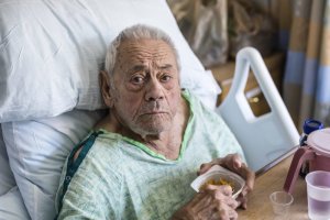 Elderly Man Hospital Patient Eating in bed