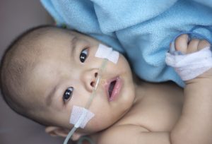 baby with nasal cannulae