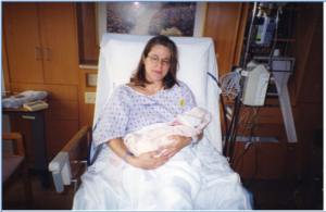 Susannah holding her son after he was stillborn